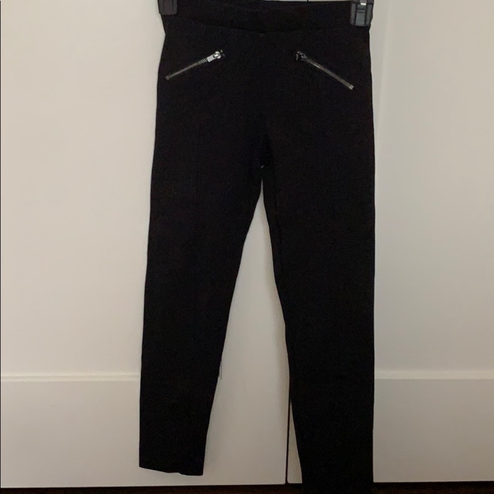 Black pants with zippers